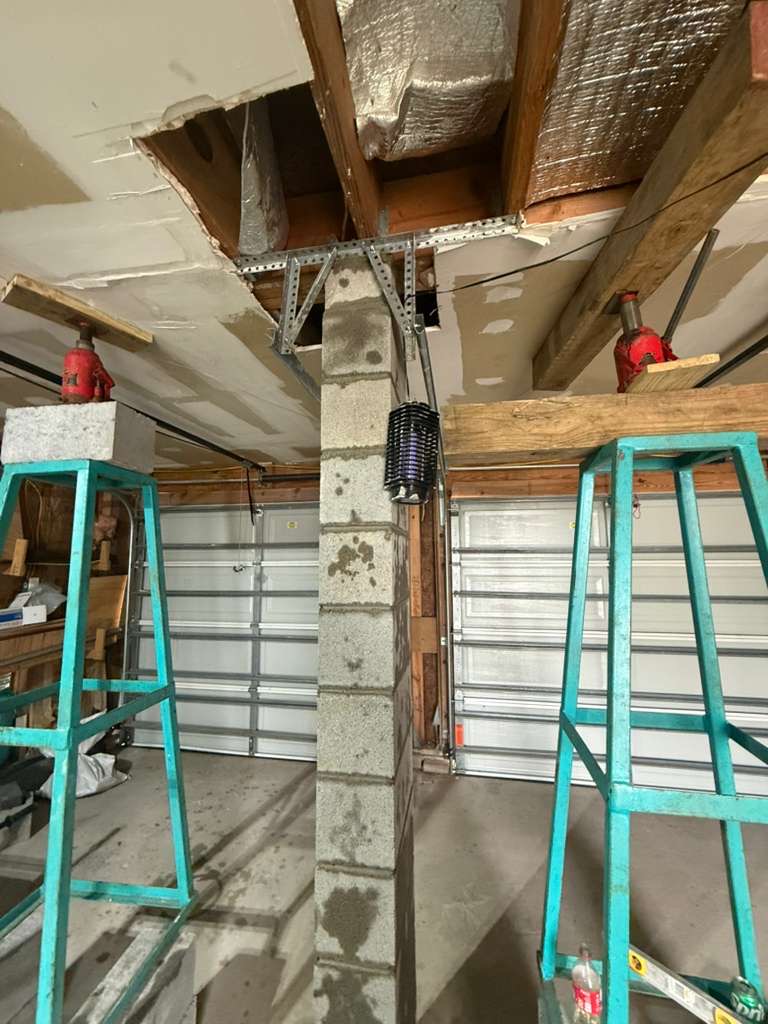 Crawl space inspection showing pier settlement